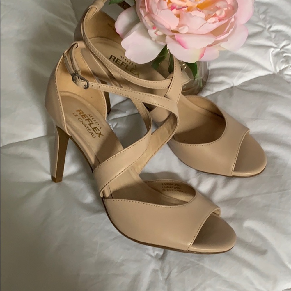 Brand new with tags beige peep toe heel.